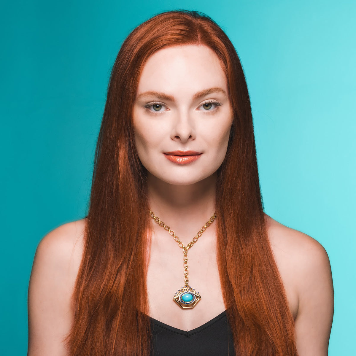 Small Turquoise + Blue Sapphire Eye Pendant on model