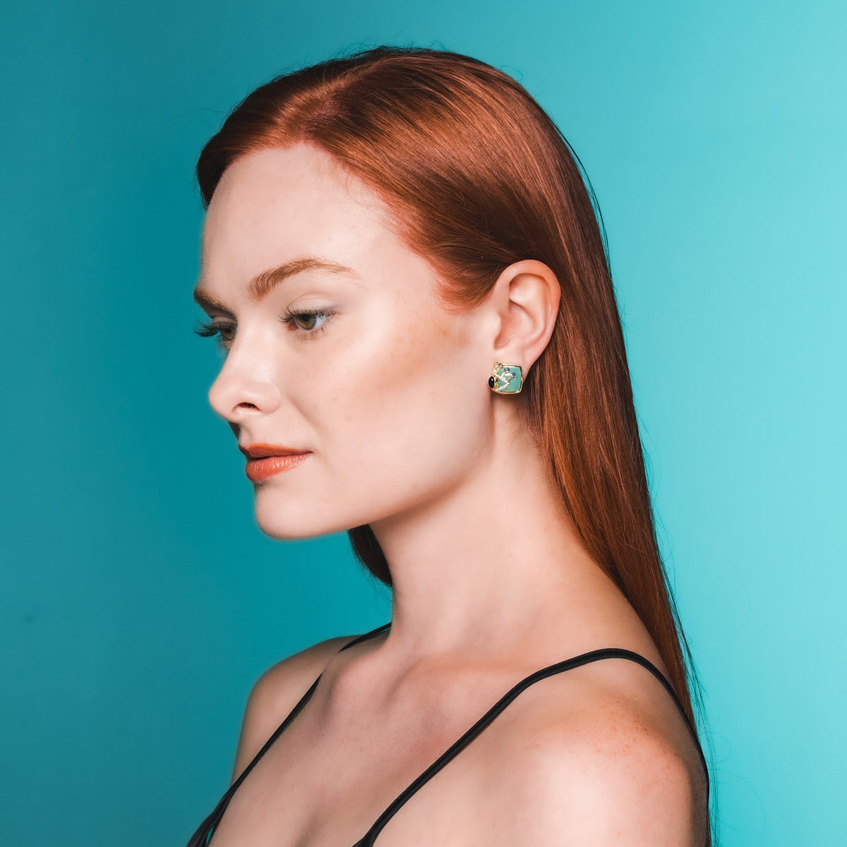 Side Eye Button Earrings on model