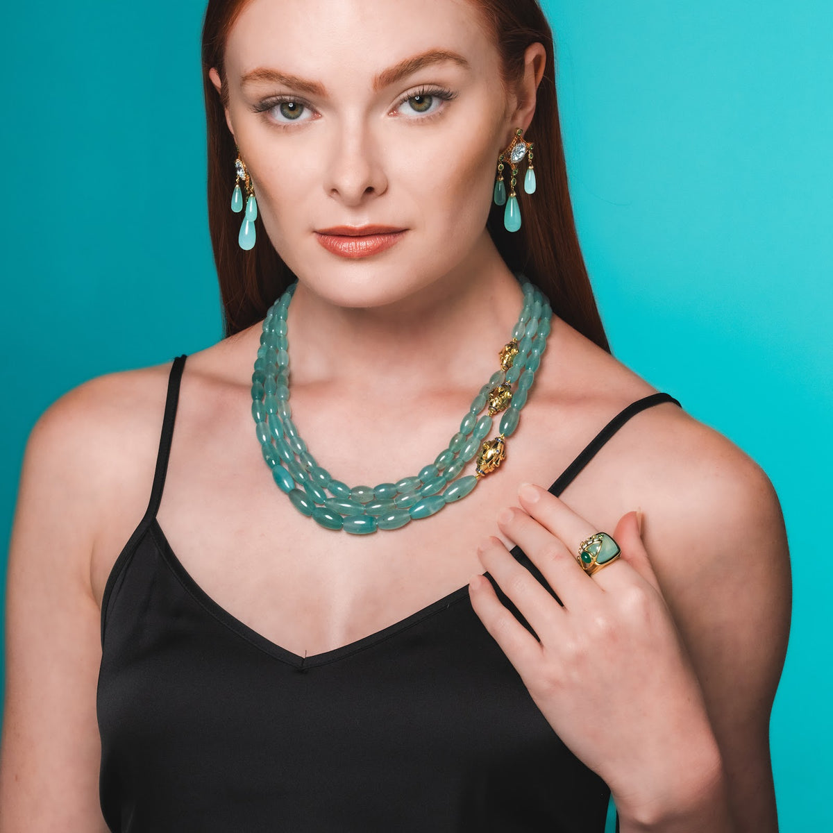 3 Layer Face Motif Necklace with Blue Sapphire on model